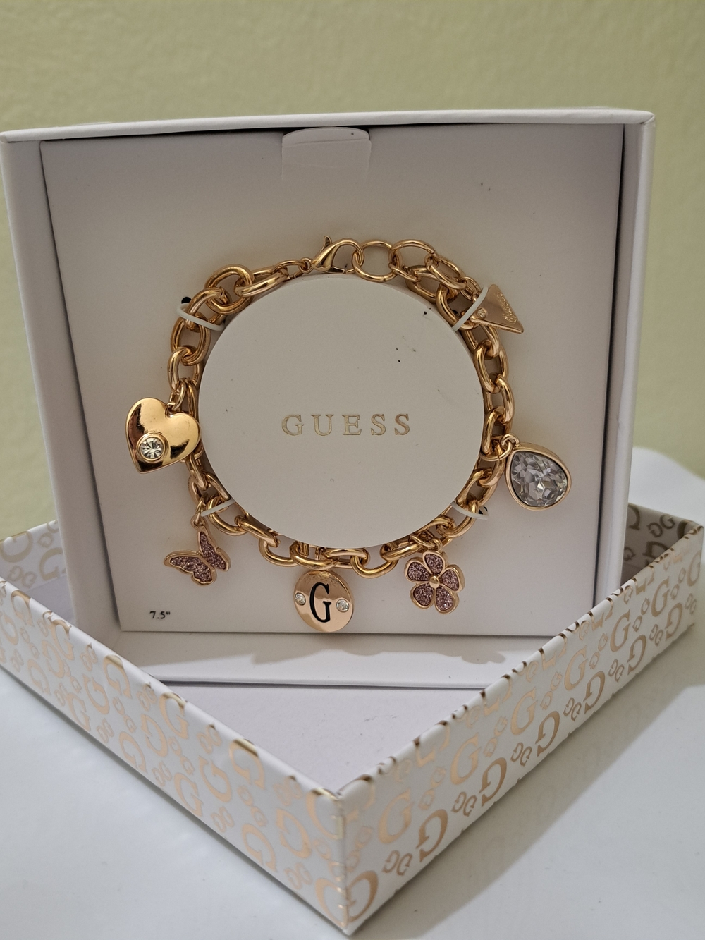 GUESS Gold-Tone Charm Bracelet with Crystal Accents - Picture 2 of 4